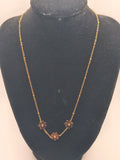 Collier Marguerites Dorées – Acier inoxydable