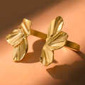 Bracelet en jonc fleur elégance dore
